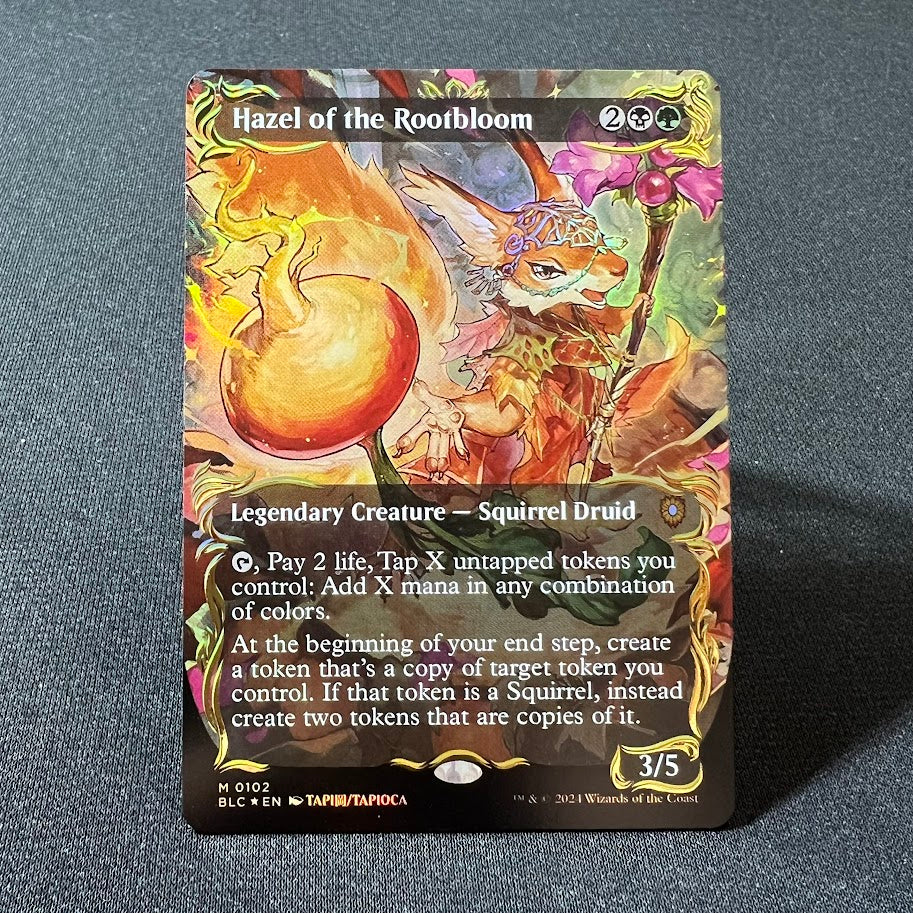 Hazel of the Rootbloom - Bloomburrow #102 - Raised Foil