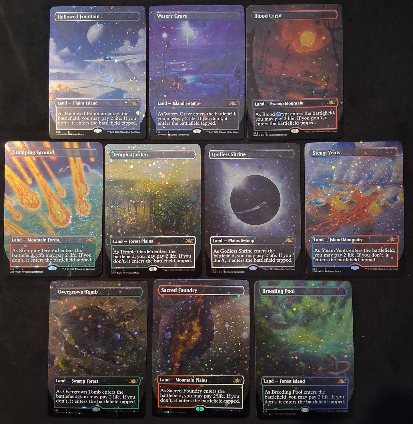 Pack 10 Shock Lands - Unfinity - Galaxy Foil